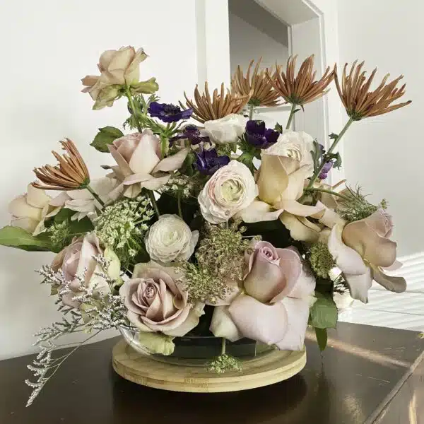 A romantic and elegant bouquet of Garden Roses and Miniature Roses for sale at our Washington, NC, florist.