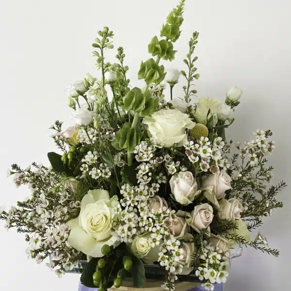 A classic and elegant bouquet of flowers, including Garden Roses and Stocks, for sale at our Washington, NC, florist.