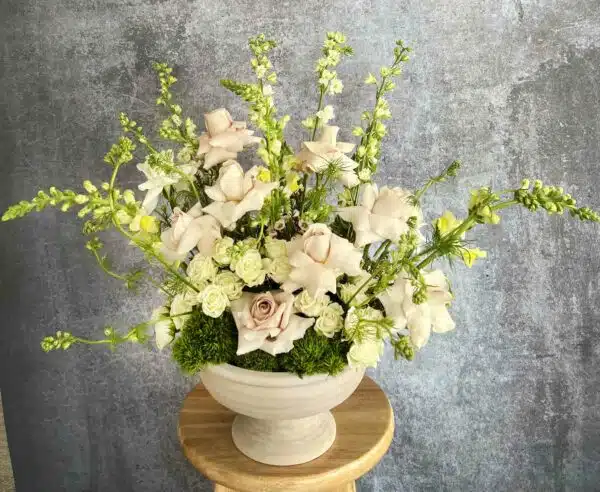 A romantic bouquet of white and pastel flowers, including Snapdragons and Roses, for sale at our Washington, NC florist.
