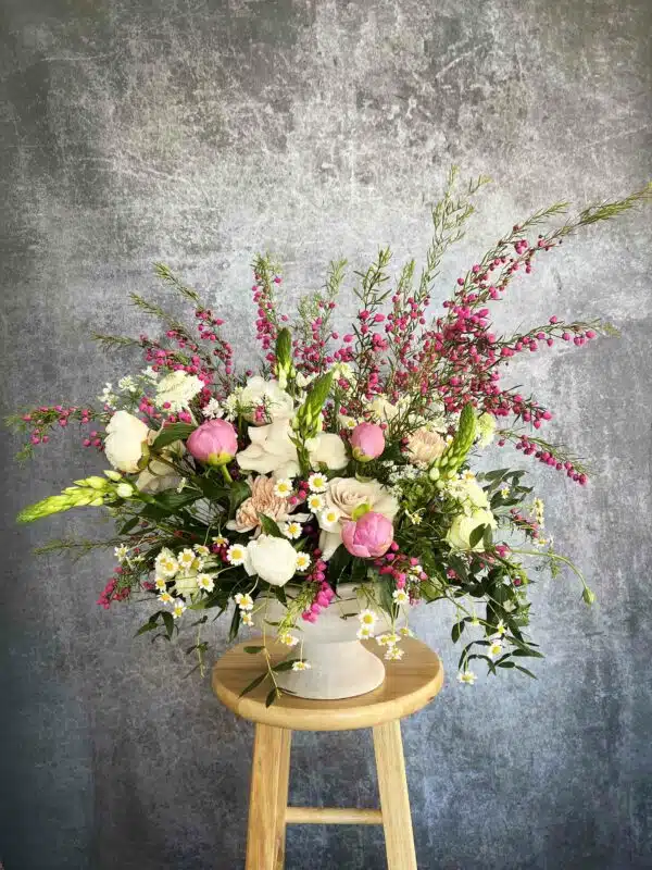 A premium bouquet of romantic flowers, including Garden Roses and Orchids, for sale at our Washington, NC, florist.